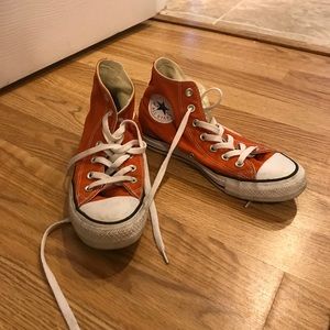 Orange high top converse